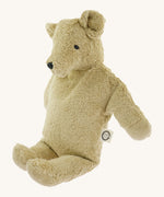 Side view of the Senger large beige bear - a GOTS organic cotton soft huggable bear showing its embroidered facial features