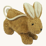 A Senger beige coloured rabbit bag on a plain background.