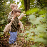 A child holding a Senger small Cuddly Goose organic soft toy in a creamy Linen colour. A child holding the large goose can be seen in the background. These soft toys are created from the highest quality, sustainable and traceable natural materials. Senger cuddly animal toys and soft dolls are handmade in Germany with love and attention to detail and we are proud Senger stockists here at Babipur. 