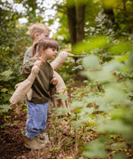 A child holding a Senger small Cuddly Goose organic soft toy in a creamy Linen colour. A child holding the large goose can be seen in the background. These soft toys are created from the highest quality, sustainable and traceable natural materials. Senger cuddly animal toys and soft dolls are handmade in Germany with love and attention to detail and we are proud Senger stockists here at Babipur. 