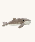 The Senger organic cotton cuddly whale stuffed animal toy, with a grey and white fluffy body.