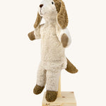 Senger Hand Puppet - Dog organic soft toy on a cream background.