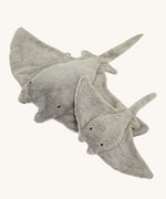 The large and small Senger organic cotton stuffed grey manta rays next to each other