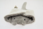 The Senger organic cotton grey stuffed manta ray cuddly toy, with its fins folded over its head