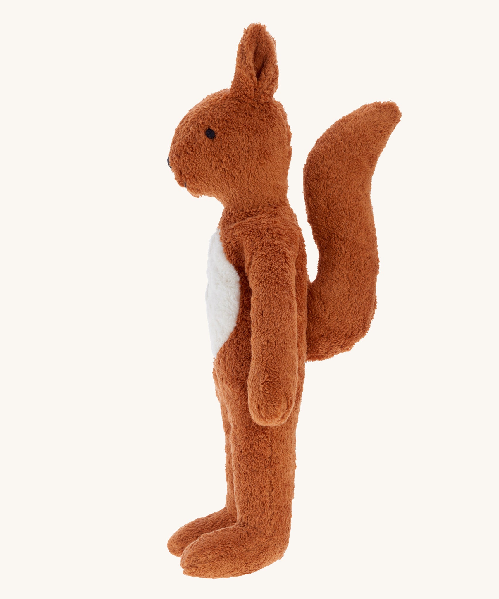A side profile view of the Senger Large Floppy Squirrel soft toy.