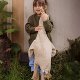 A child holding a Senger Large Cuddly Goose organic soft toy in a creamy Linen colour. These soft toys are created from the highest quality, sustainable and traceable natural materials. Senger cuddly animal toys and soft dolls are handmade in Germany with love and attention to detail and we are proud Senger stockists here at Babipur. 