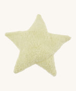 Senger warming star cushion. A light yellow fluffy GOTS organic cotton cushion that can be warmed up.