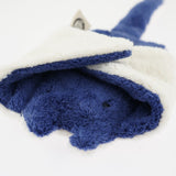 A closeup of the Senger small cuddly blue manta ray, with its fins folded over its body
