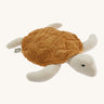 Senger Cuddly Rust Turtle - Small organic heatable soft toy on a cream background.