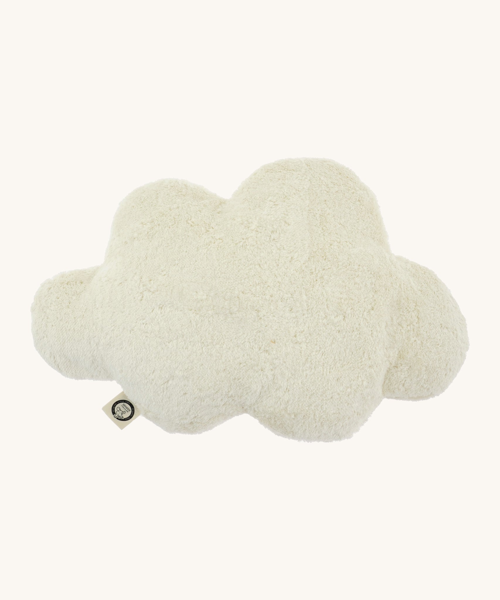 Senger warming cloud cushion. A white fluffy GOTS organic cotton cushion that can be warmed up.