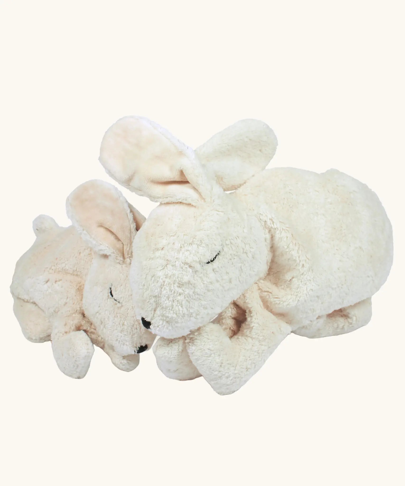 Senger large white cuddly rabbit soft toy next to the smaller version. 
