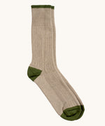 Silverstick Caburn Organic Cotton Socks in the Greto colour way. The main body of the sock is a sandy beige colour with green coloured heels, toe caps and trim.