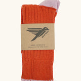 Folded Silverstick Caburn Organic Cotton Socks in rust with light purple heel and ankle trim