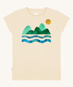 Silverstick Habitats Organic T-Shirt in the cream coloured Angora colourway. The front of the t-shirt features a mountain and sea graphic with a sun.