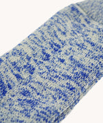 A close up of the British made wool hiking socks by Silverstick, in a Royal Blue with grey and white patterns.