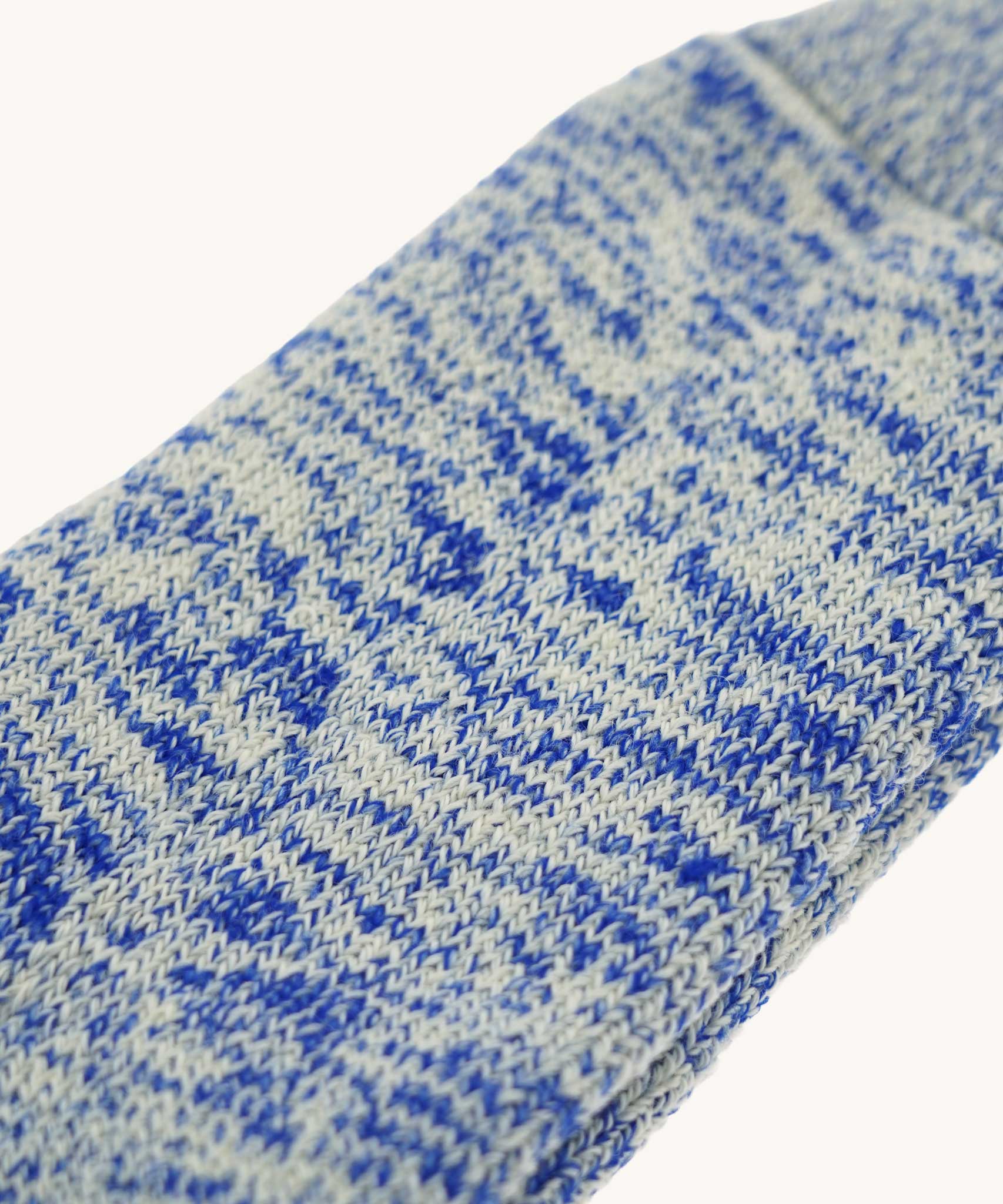 A close up of the British made wool hiking socks by Silverstick, in a Royal Blue with grey and white patterns.