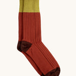 Silverstick Matt Sewell Hawfinch Merino Socks, red coloured socks with dark red heel and toe caps and a contrasting lime band of colour at the top. 