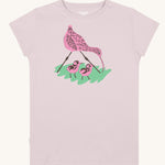 Silverstick Matt Sewell Curlew Organic T-Shirt in a Lilac colourway. The graphic on the front of the t-shirt features a pink curlew with two chicks and green surface. 