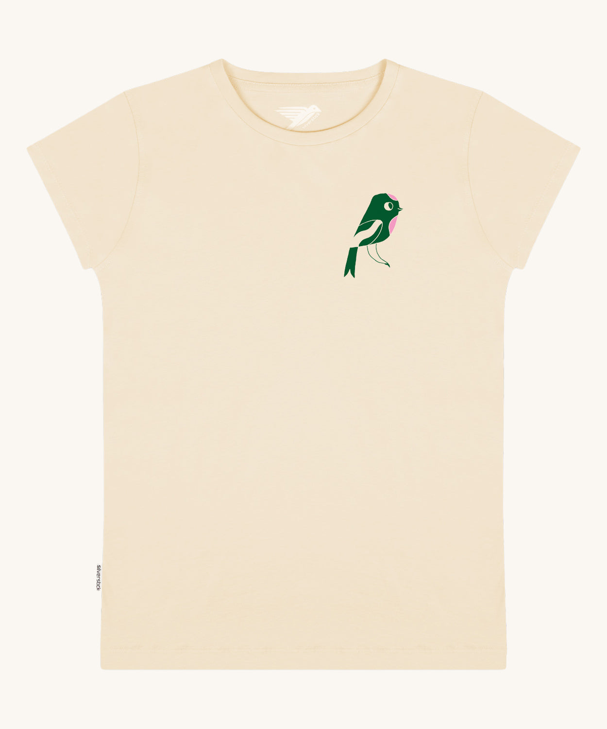 The front of the Silverstick Matt Sewell Rewild Organic women's T-Shirt in the cream coloured Angora colourway. The front of the tee features a green and pink coloured bird graphic on the left chest. 