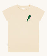 The front of the Silverstick Matt Sewell Rewild Organic women's T-Shirt in the cream coloured Angora colourway. The front of the tee features a green and pink coloured bird graphic on the left chest. 
