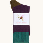 Silverstick Matt Sewell Turtle Dove Merino Wool Socks shown folded over and placed into a paper packaging sleeve. 