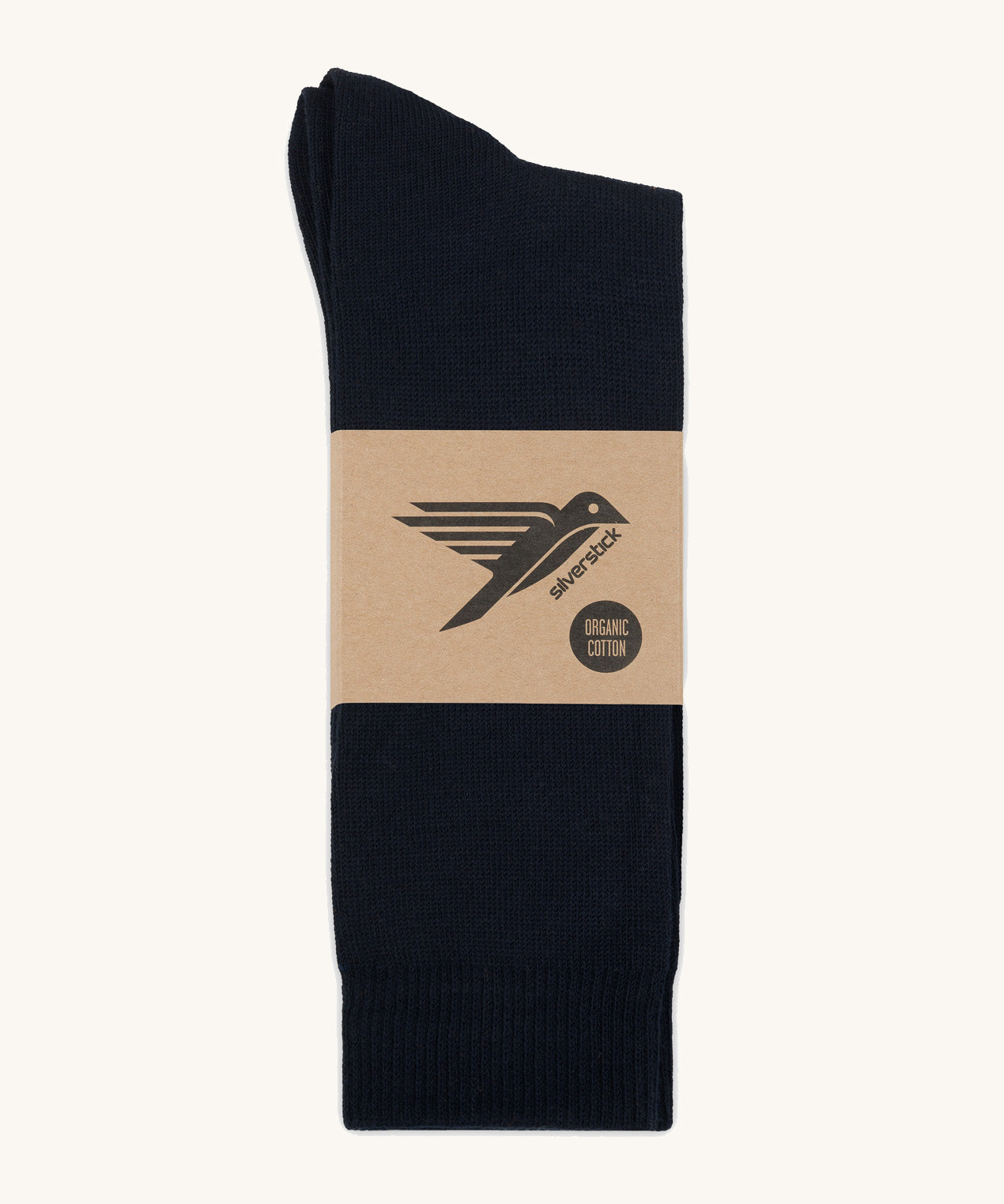 A pair of black GOTS-Certified organic cotton everyday socks by Silverstick in recyclable paper packaging, made in Britain.