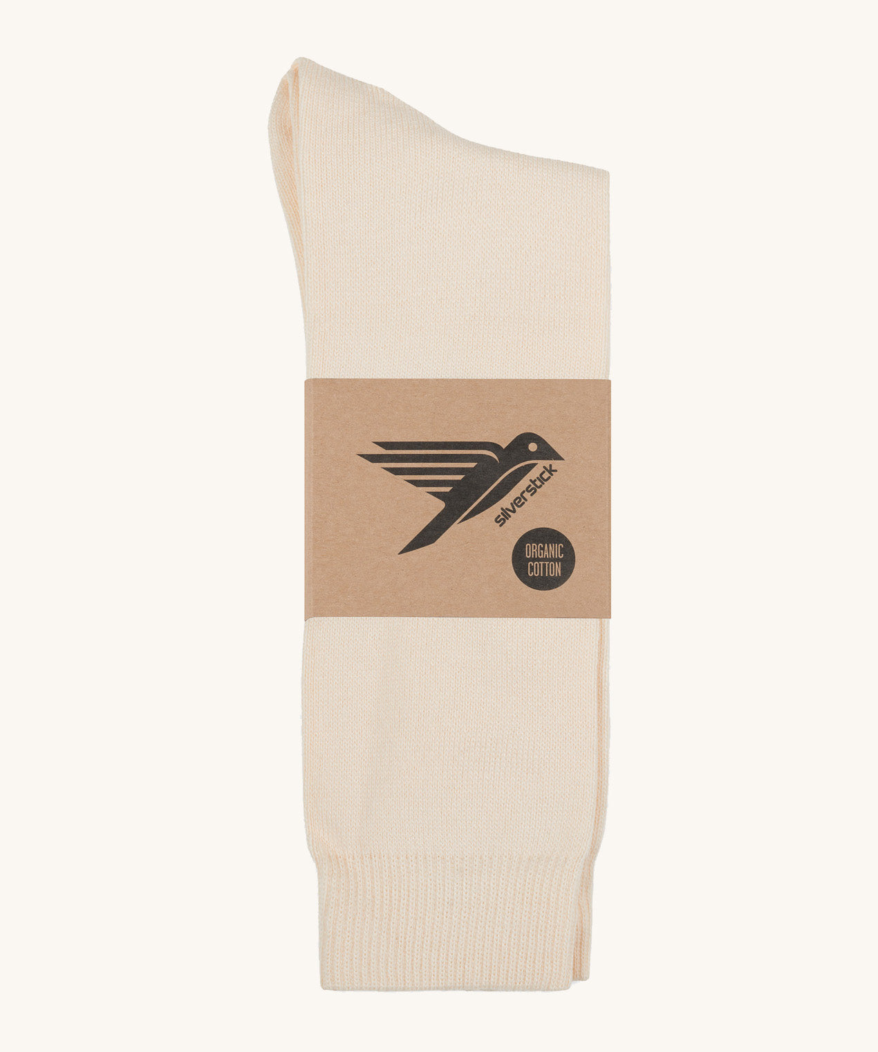 A pair of white GOTS-Certified organic cotton everyday socks by Silverstick in recyclable paper packaging, made in Britain.