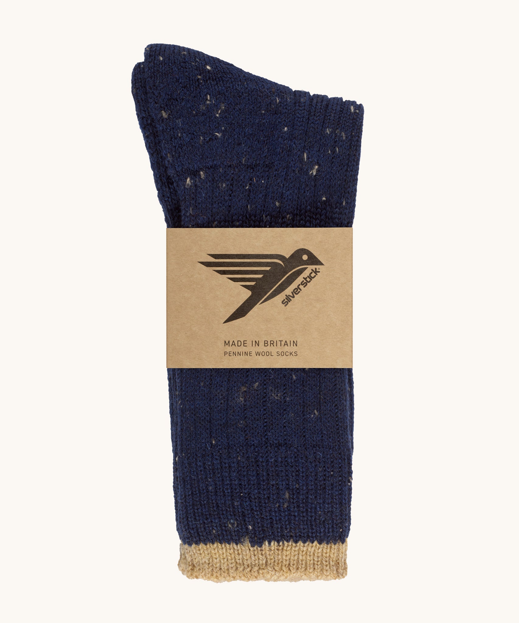 Silverstick Pennine Wool Socks in Navy. The socks are shown folded over and placed in the cardboard packaging slip. 