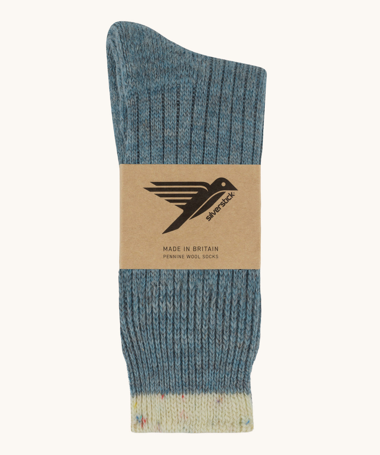 The Silverstick Pennine Wool Socks in the summer storm colourway shown folded over and placed in their cardboard packaging sleeve. 