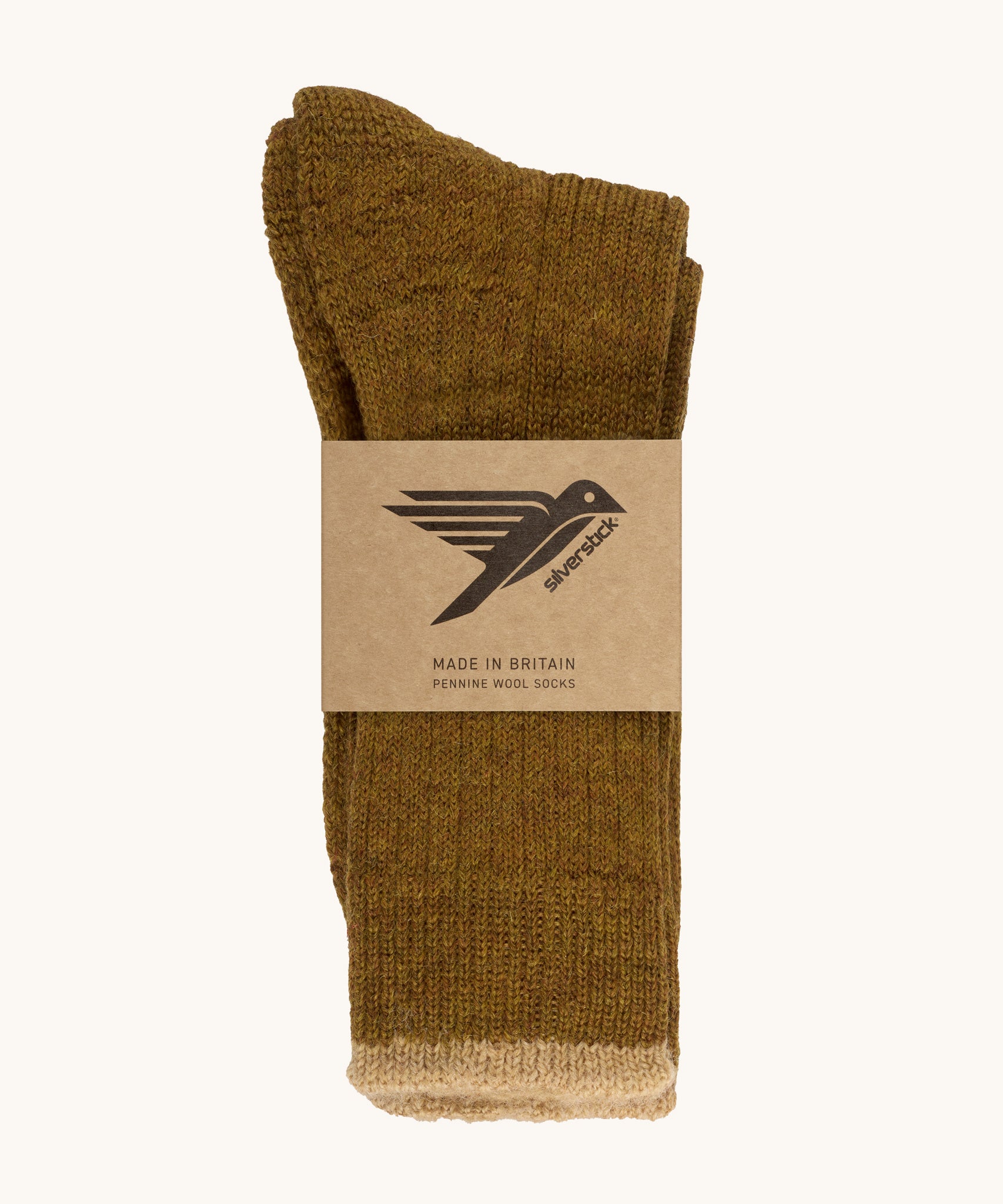 The Silverstick Pennine Wool Socks in the Harvest colourway shown folded over and placed in their cardboard packaging sleeve. 