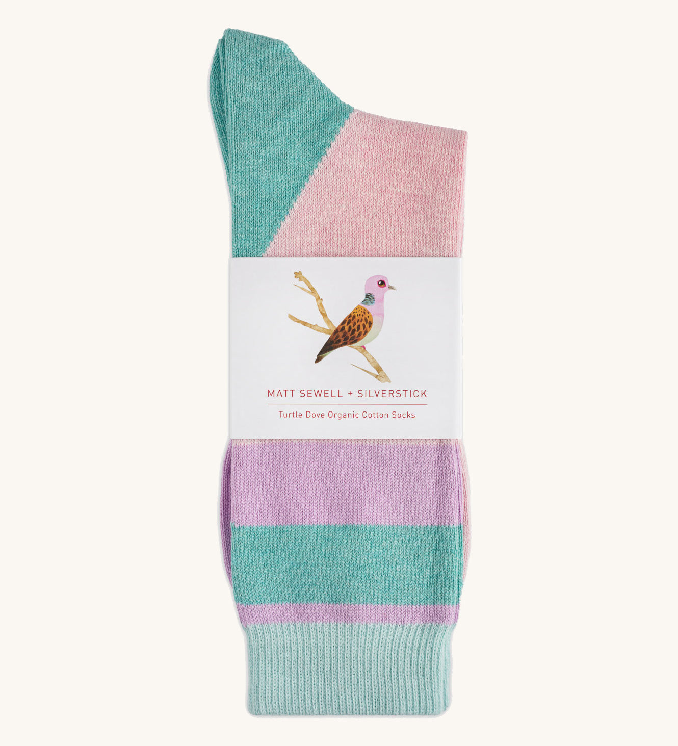A pair of Turtle Doves organic cotton socks by Silverstick and Matt Sewell, made in Britain with a cardboard band.