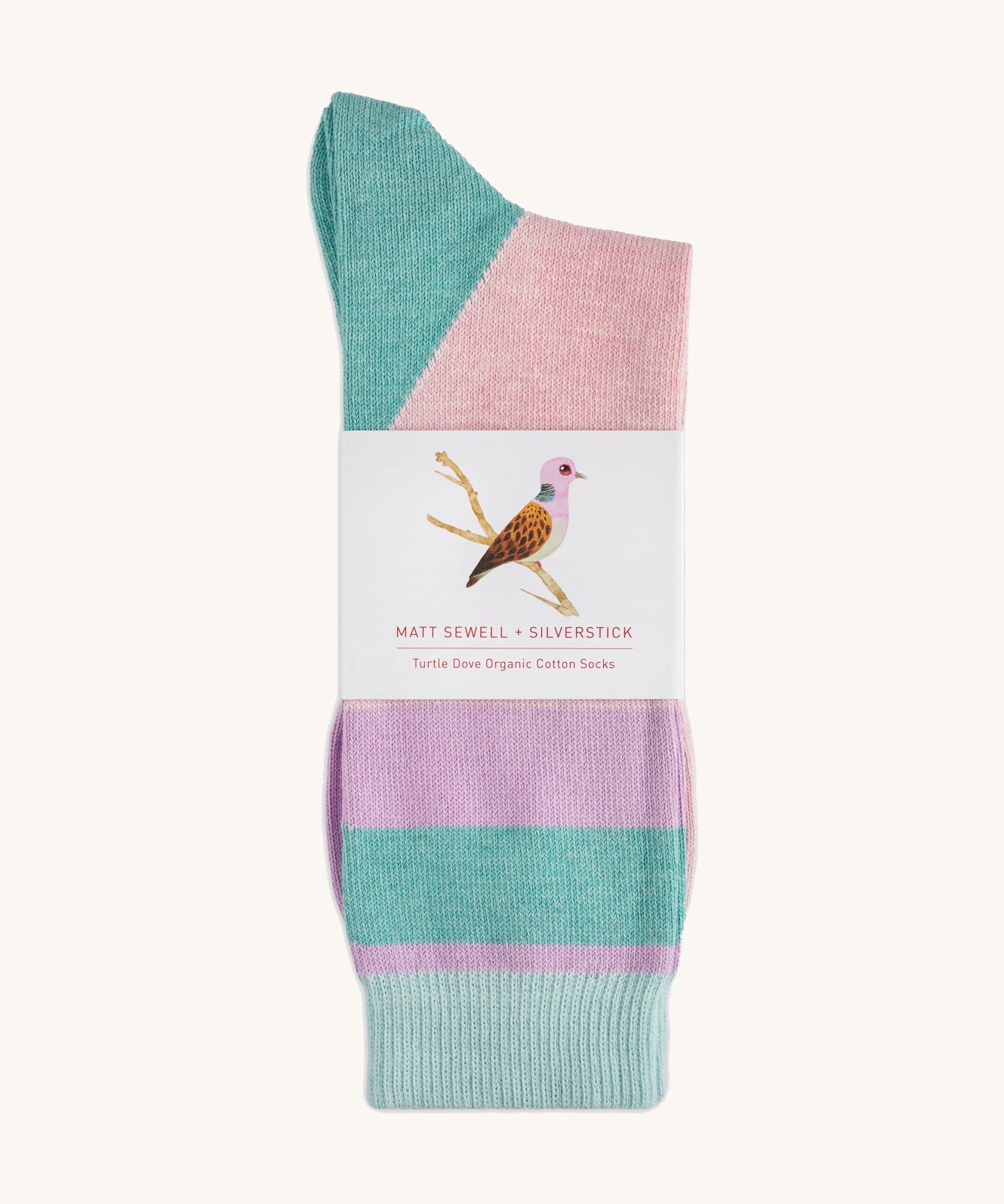 A pair of Turtle Doves organic cotton socks by Silverstick and Matt Sewell, made in Britain with a cardboard band.