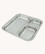 A Slice Of Green Stainless Steel Divided Plate. The plate has three sections, small, medium and large. This stainless steel plate is suitable for snacks and meals and perfect for children and adults. 