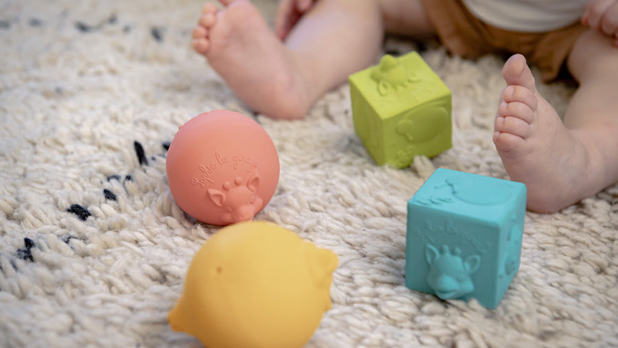 Sophie the Giraffe natural rubber teething cubes and balls toys. 