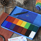 Stockmar 16 colour wax blocks set in a metal storage tin with crayon scraper and scratching tool.