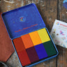 Stockmar wax blocks in 8 Waldorf colours in a storage tin.