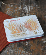 Stockmar colours of the world wax stick crayons metal storage tin.