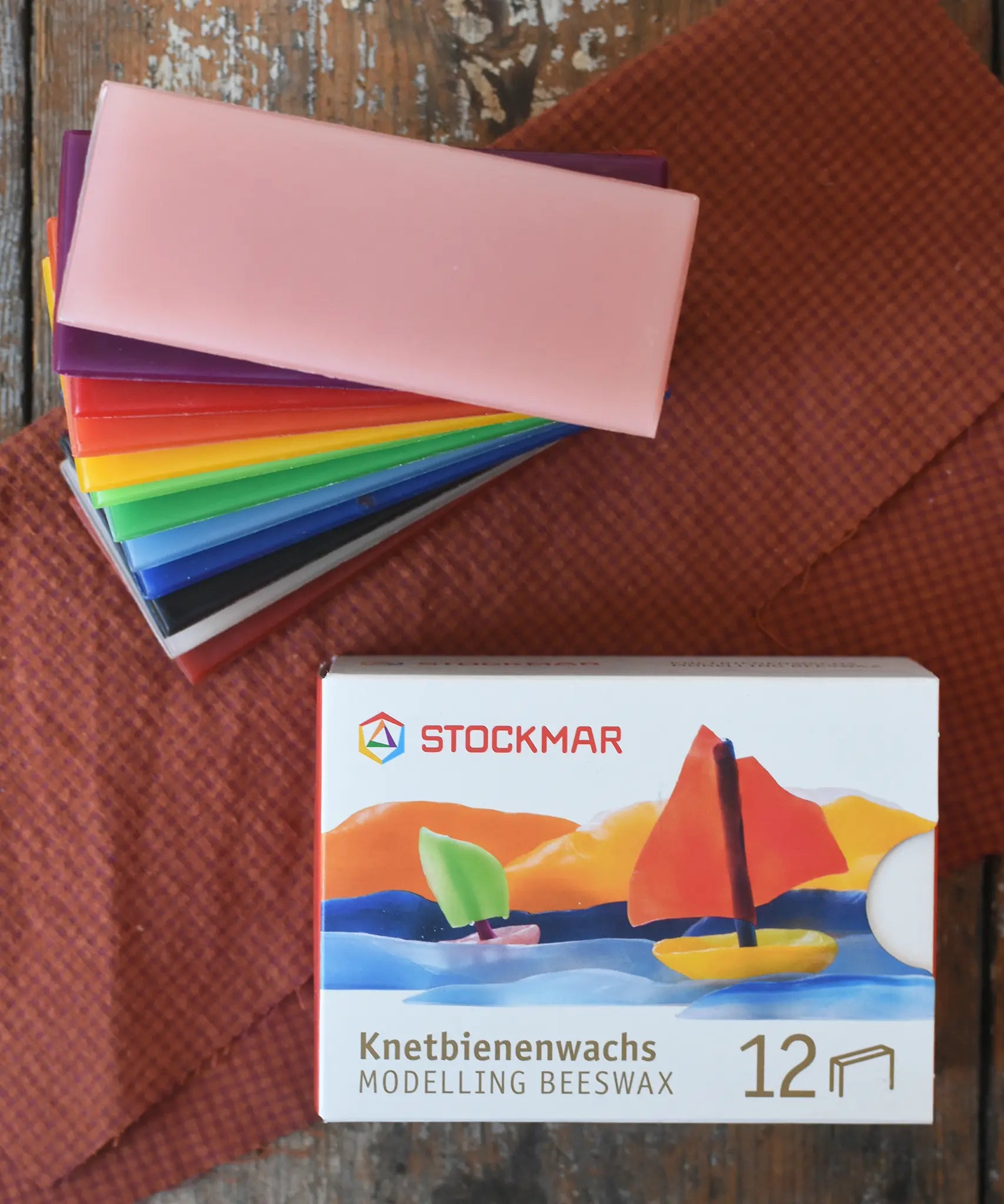Stockmar Modelling Beeswax Clay 12 Colour Sheets. Wax sheets shown out of the cardboard packaging.