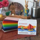 Stockmar Modelling Beeswax Clay 12 Colour Sheets. Wax sheets shown out of the cardboard packaging.