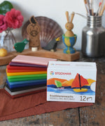 Stockmar Modelling Beeswax Clay 12 Colour Sheets. Wax sheets shown out of the cardboard packaging.