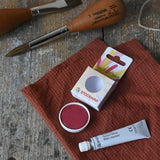 Stockmar Opaque Watercolour Replacement in red next to opaque white 7.5ml tube. 