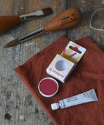 Stockmar Opaque Watercolour Replacement in red next to opaque white 7.5ml tube. 