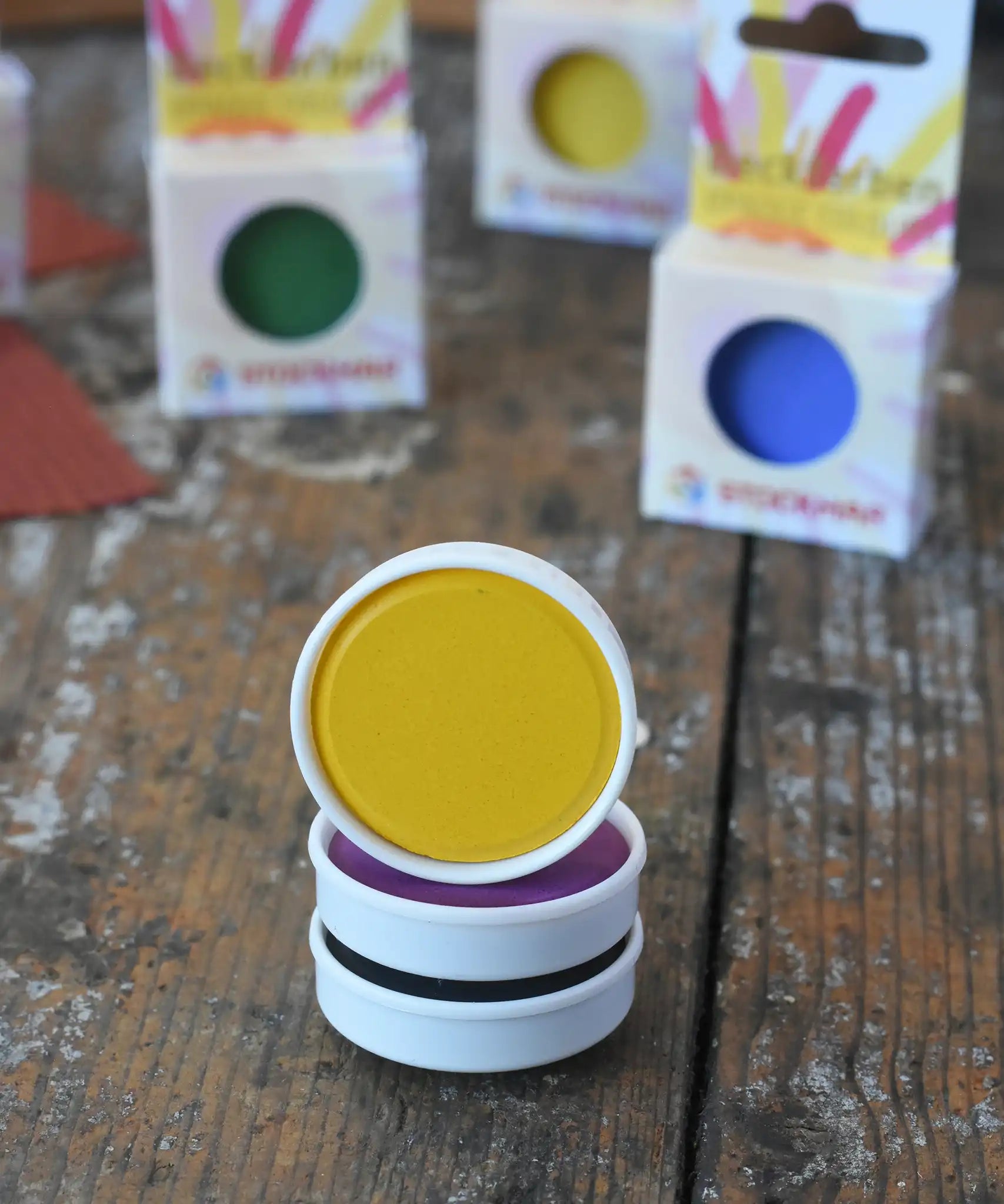 Stack of three Stockmar opaque watercolour replacement tablets.