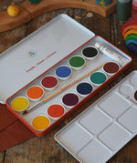 Stockmar Opaque Watercolour Paint Tin Set with 12 colours, palette, paintbrush, opaque white paint tube all in a metal storage tin.