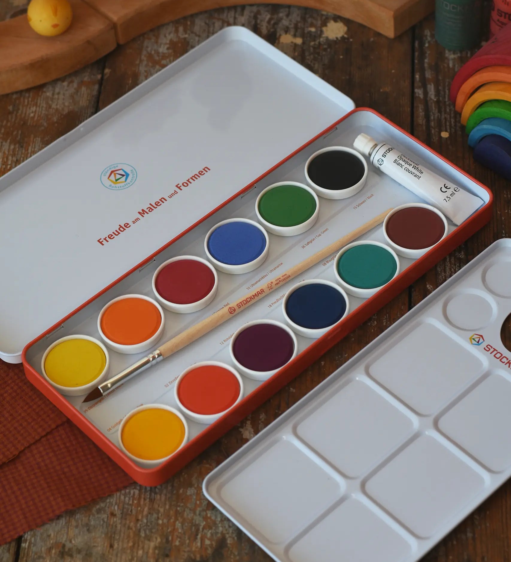 Stockmar Opaque Watercolour Paint Tin Set with 12 colours, palette, paintbrush, opaque white paint tube all in a metal storage tin.