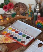 Stockmar Opaque Watercolour Paint Tin Set with 12 colours, palette, paintbrush, opaque white paint tube all in a metal storage tin.