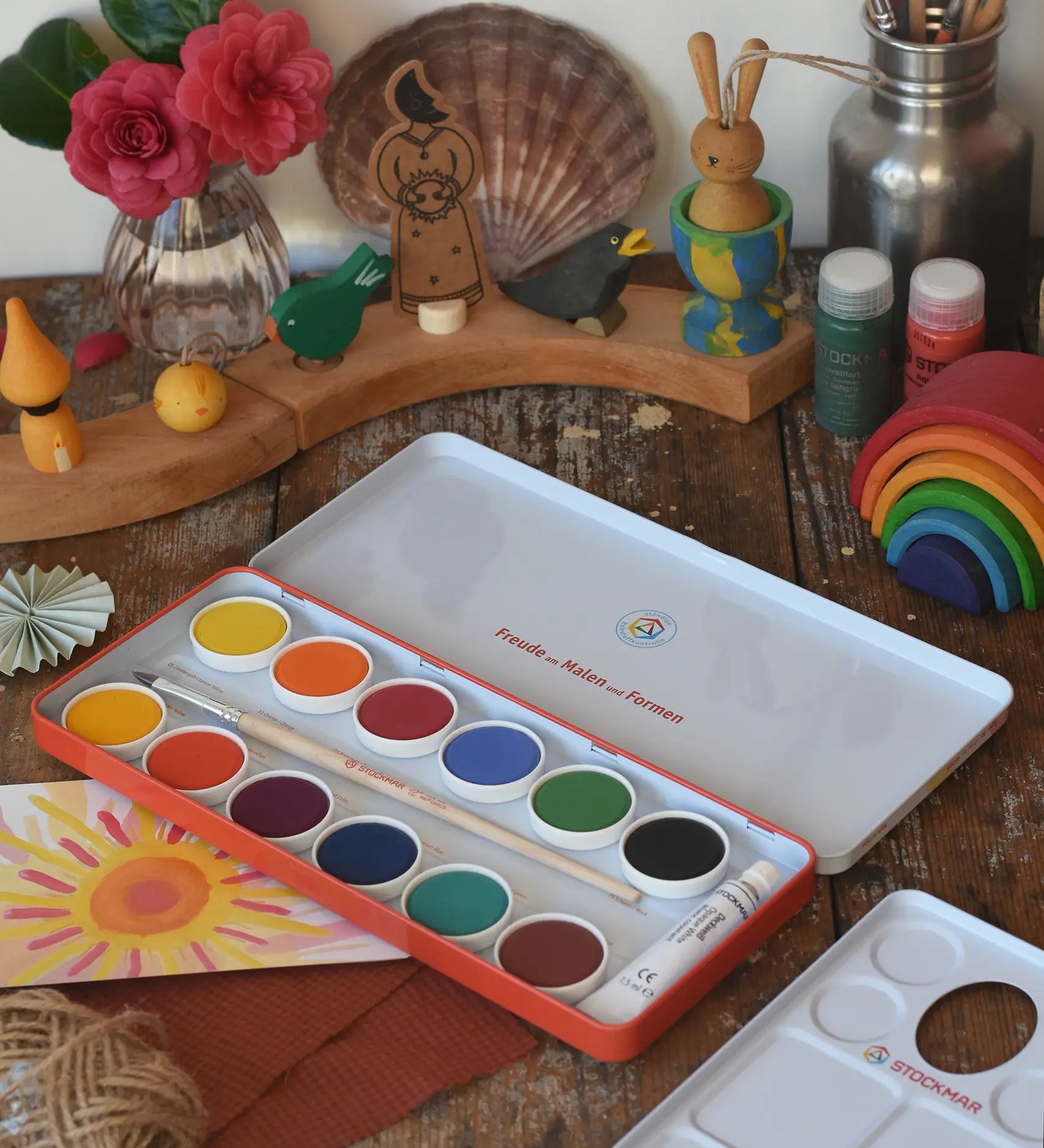 Stockmar Opaque Watercolour Paint Tin Set with 12 colours, palette, paintbrush, opaque white paint tube all in a metal storage tin.