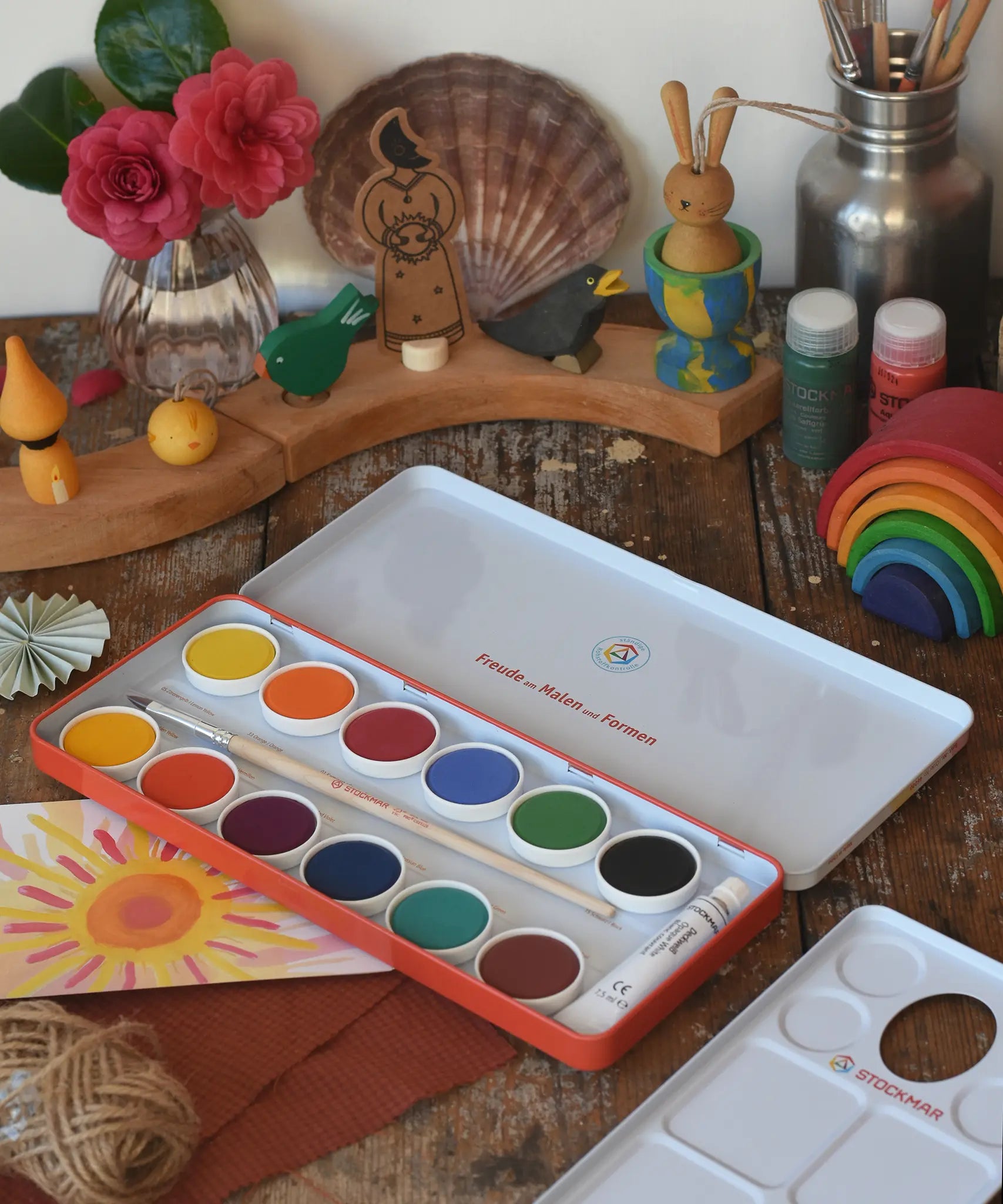 Stockmar Opaque Watercolour Paint Tin Set with 12 colours, palette, paintbrush, opaque white paint tube all in a metal storage tin.