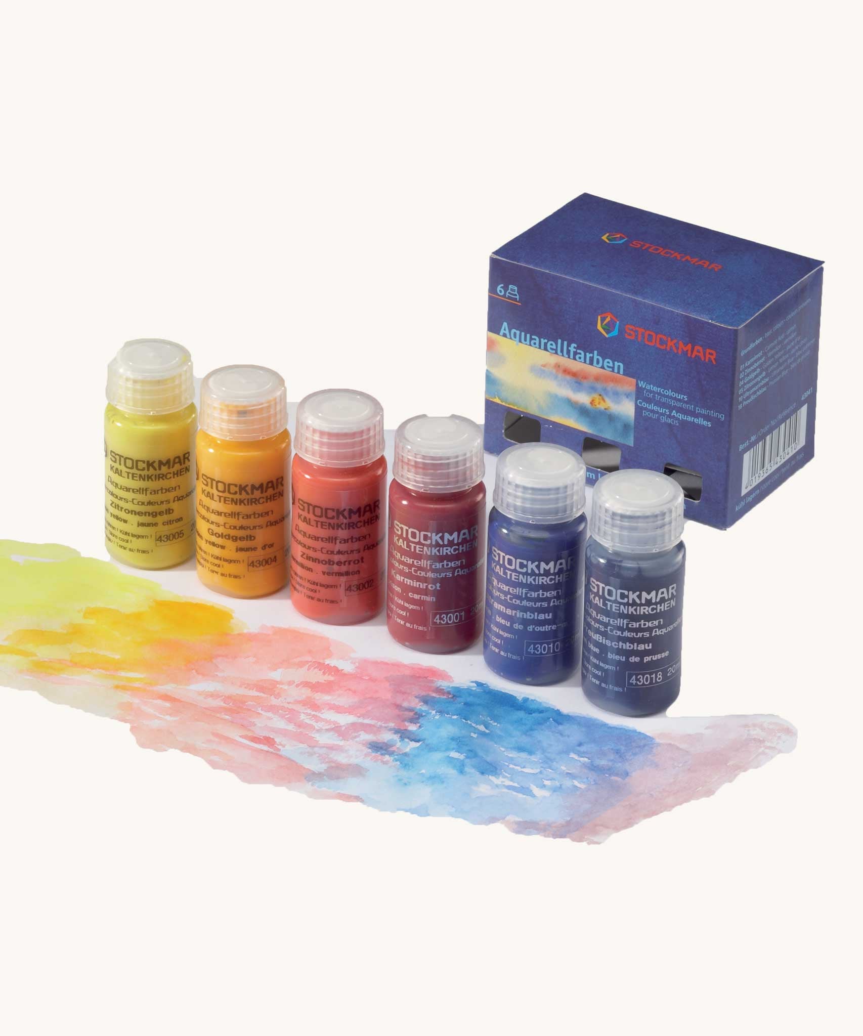 Stockmar Watercolour Paint Basic Set. Six 20ml bottles of Stockmar watercolour paints in shades, lemon yellow, golden yellow, vermillion, carmine red, ultramarine blue and prussian blue.