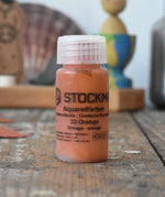 Stockmar 20ml liquid watercolour paint in orange.
